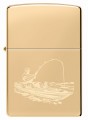 Model Zippo w eleganckim złocie z motywem samotnej białej łódki.