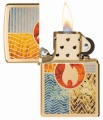 Zippo w kolorze złota z dynamicznym wzorem czterech pierwotnych sił natury.