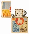 Złota zapalniczka Zippo z artystycznym motywem żywiołów inspirowanym Avatarem.