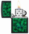 design zielonych liści na zapalniczce Zippo